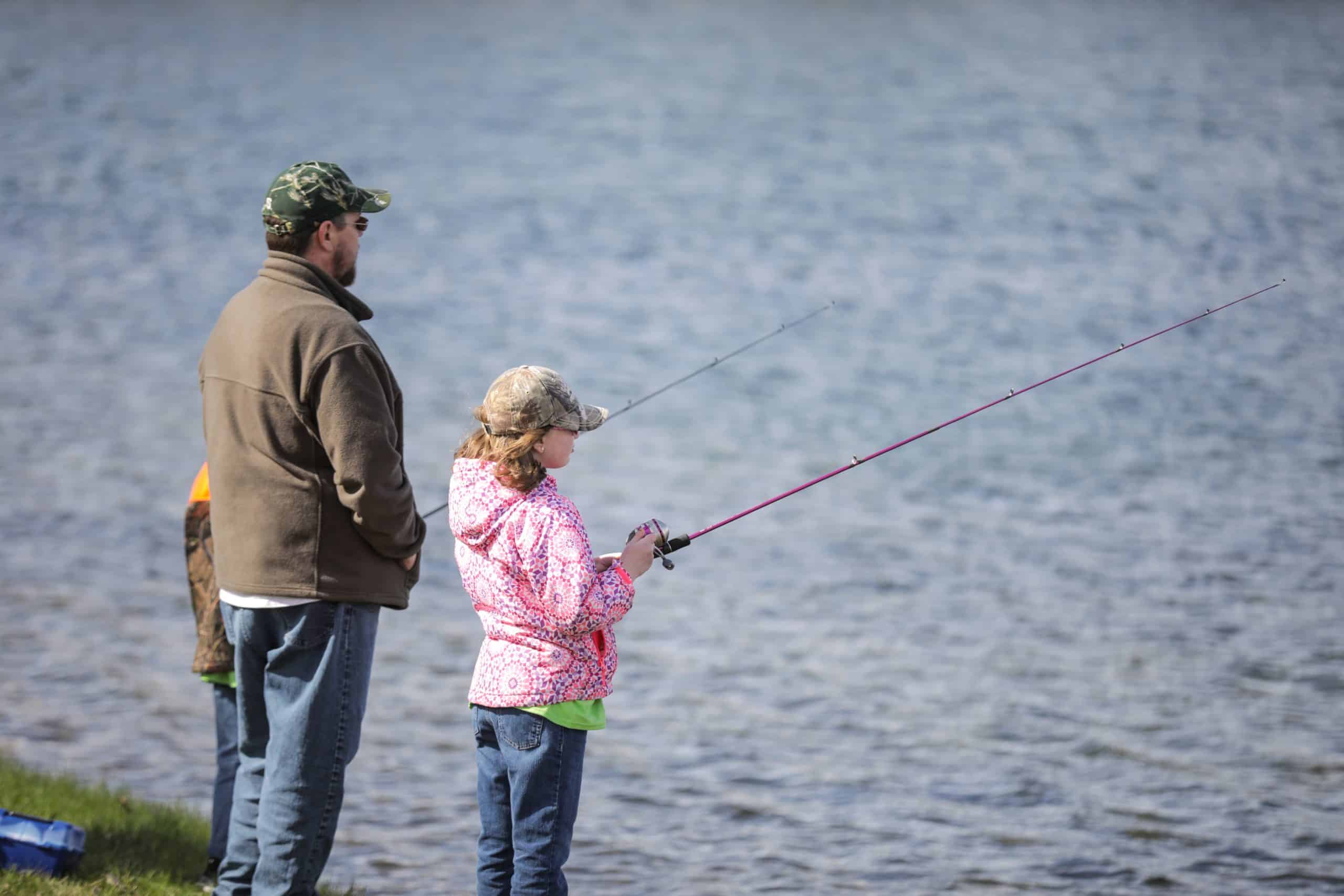 Father and daughter fishing at the Trout Derby in Sylvania