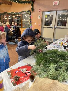 Kids enjoying arts and crafts during Christmas time